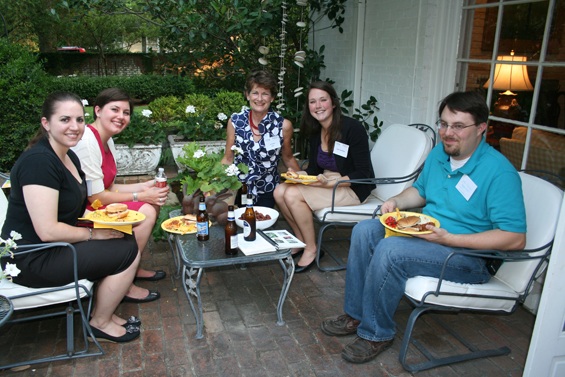 Jo Parker is surrounded by Teach For America corps members at the reception at her home. Parker and Ed Kossman, Jr. initiated the idea of “Delta Hospitality Night” to welcome corps members to Cleveland.